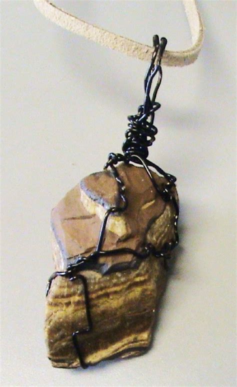 Unlocking Inner Wisdom with a Tiger Eye Amulet Necklace